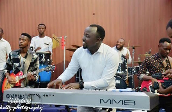 Livingstone performing with Asaphe Music International at ZION TEMPLE - GATENGA